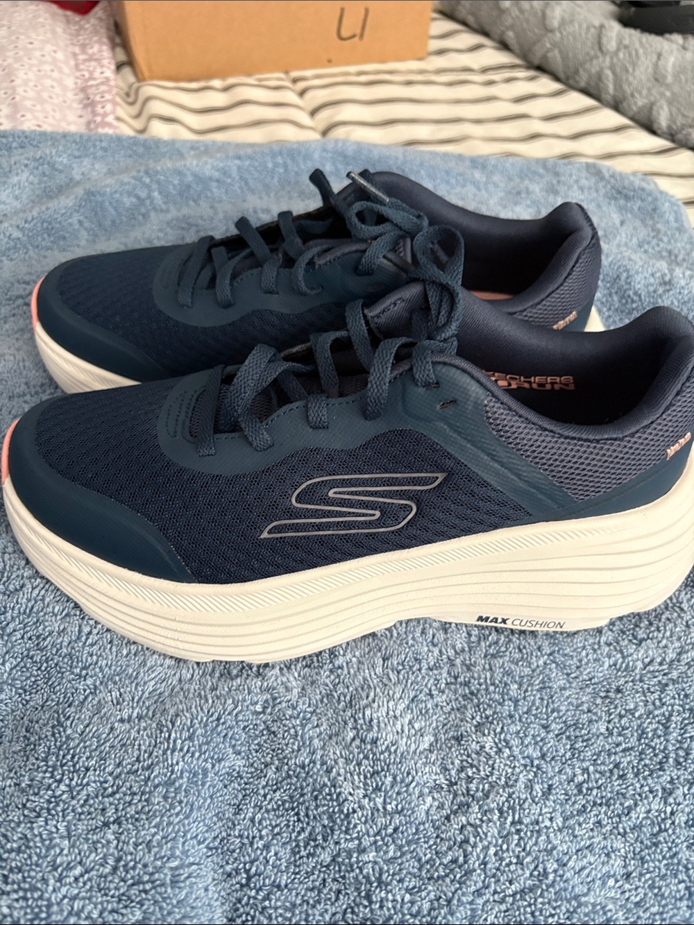 Skechers Women's Navy Athletic Sneakers with White Platform and Pink Accent